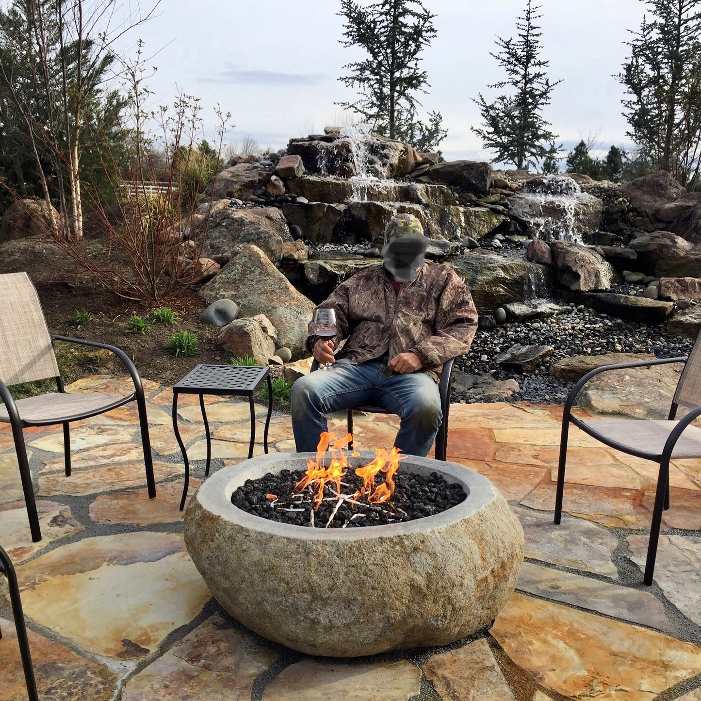 Real rock boulder or stone propane or natural gas burning fire pits from Impact Imports
