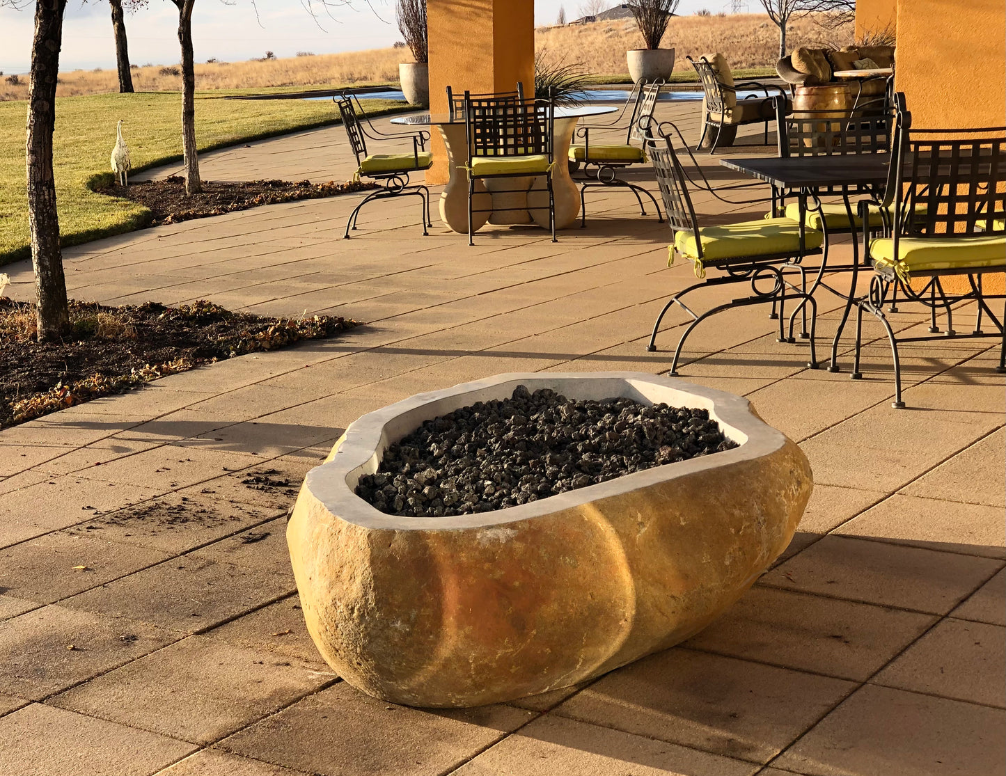 Real rock boulder or stone propane or natural gas burning fire pits from Impact Imports