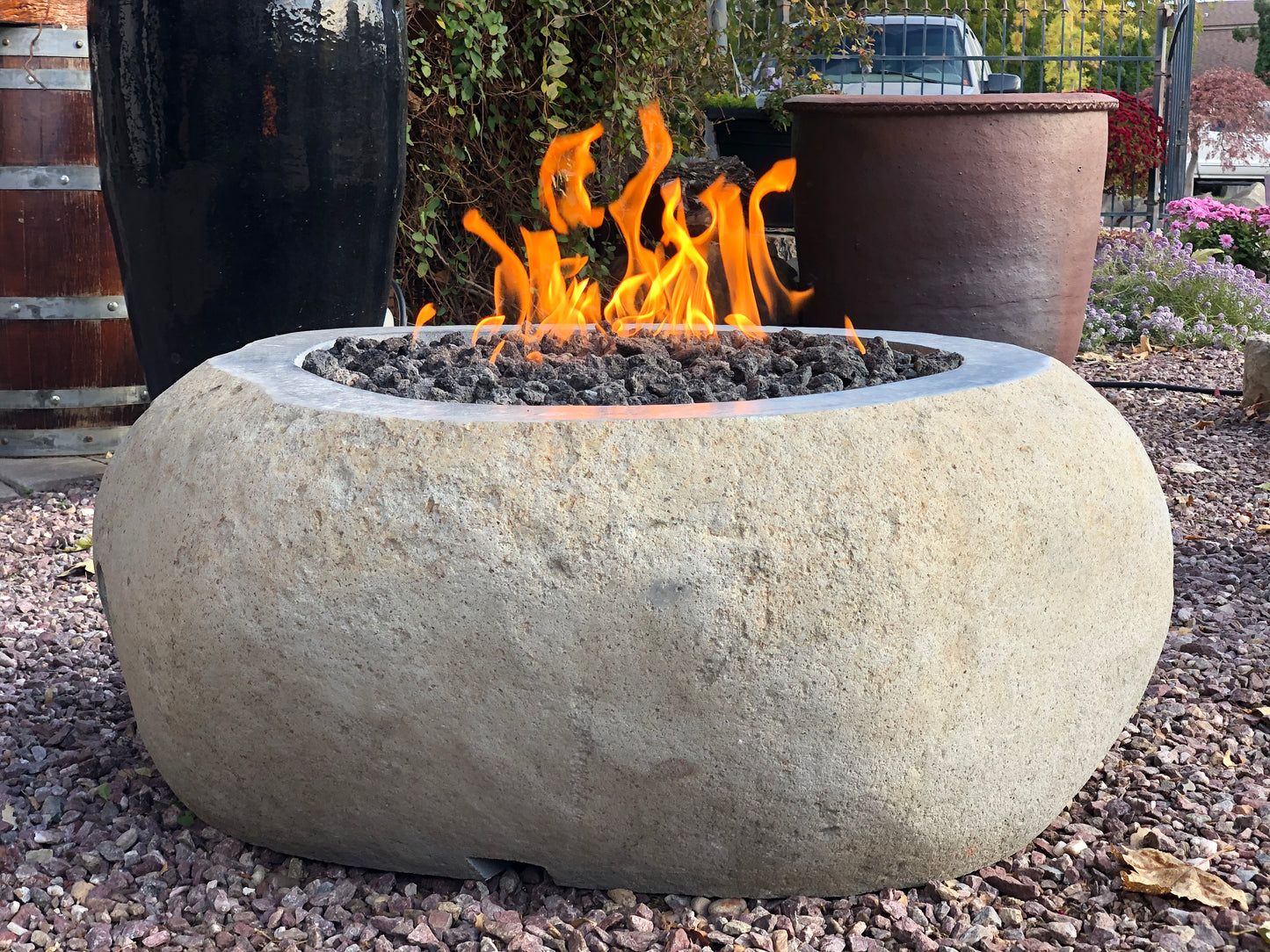 Real rock boulder or stone propane or natural gas burning fire pits from Impact Imports