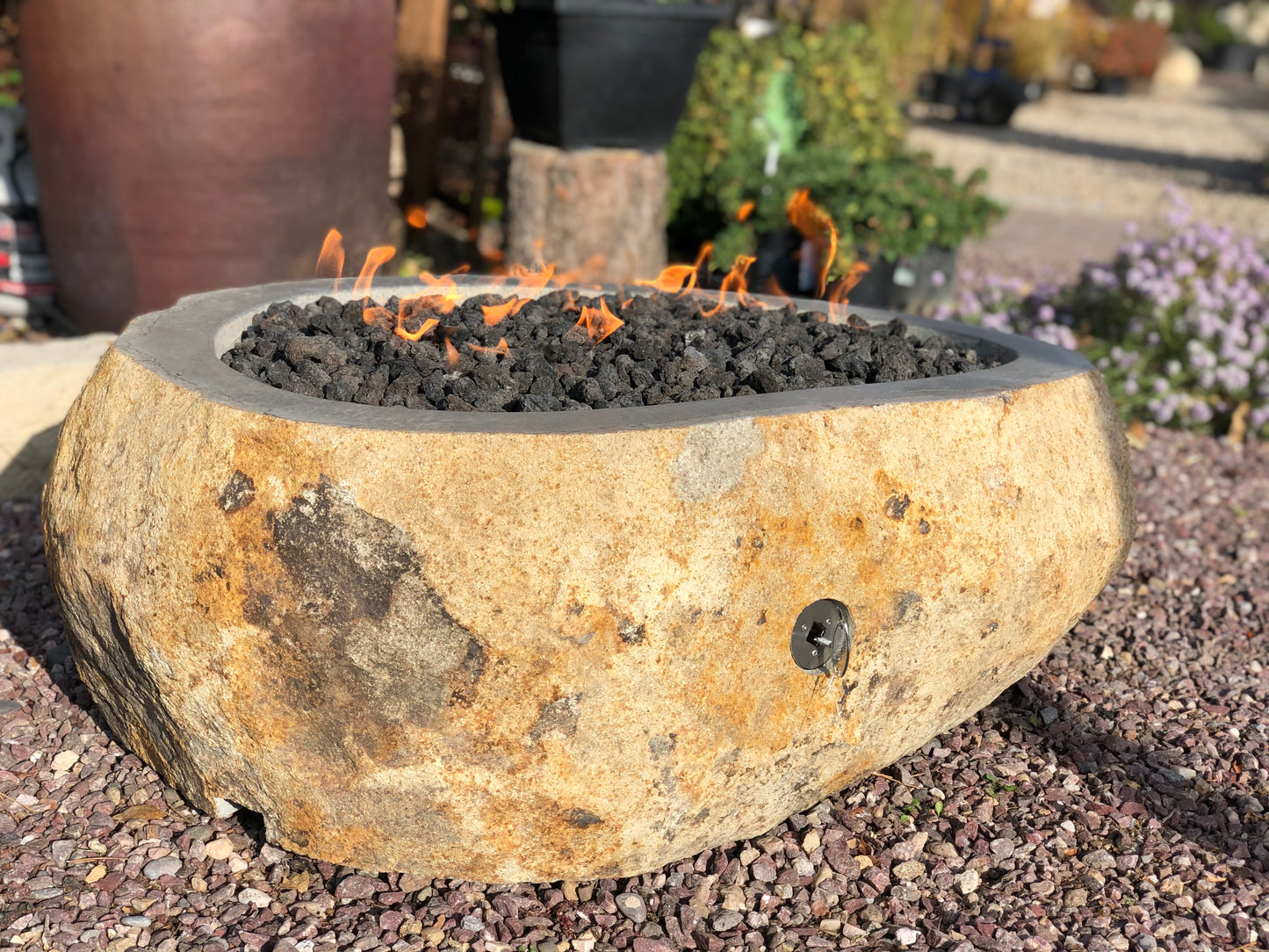 Real rock boulder or stone propane or natural gas burning fire pits from Impact Imports