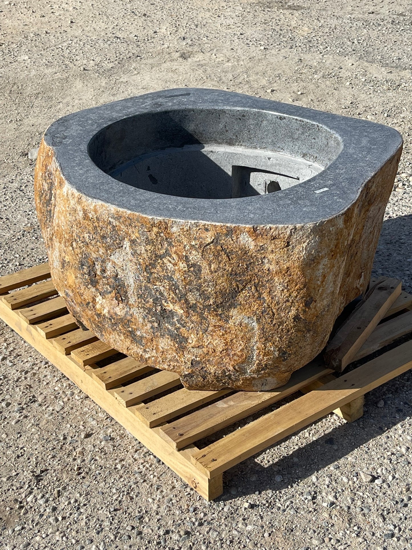 Real rock boulder or stone propane or natural gas burning fire pits from Impact Imports