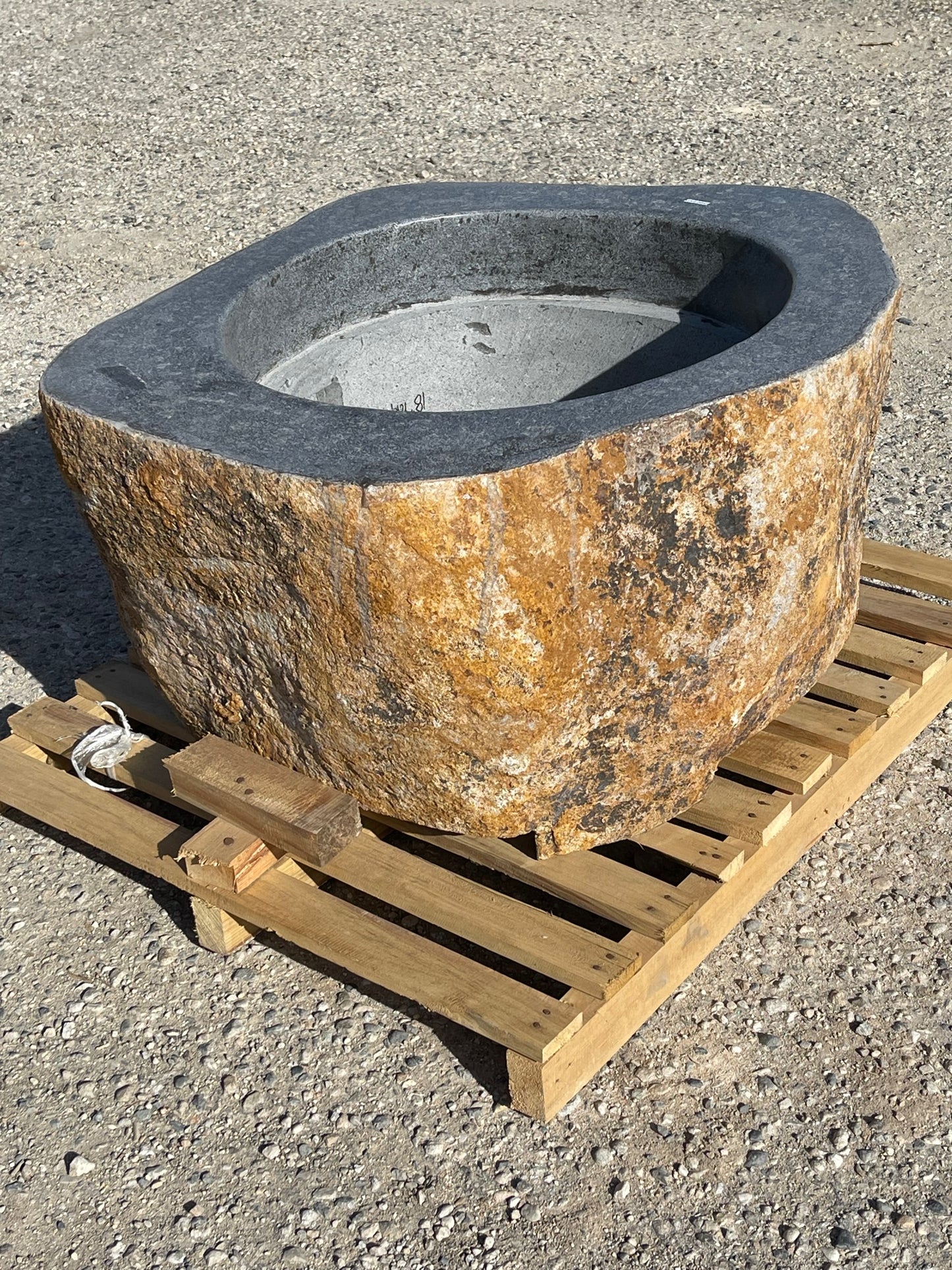 Real rock boulder or stone propane or natural gas burning fire pits from Impact Imports