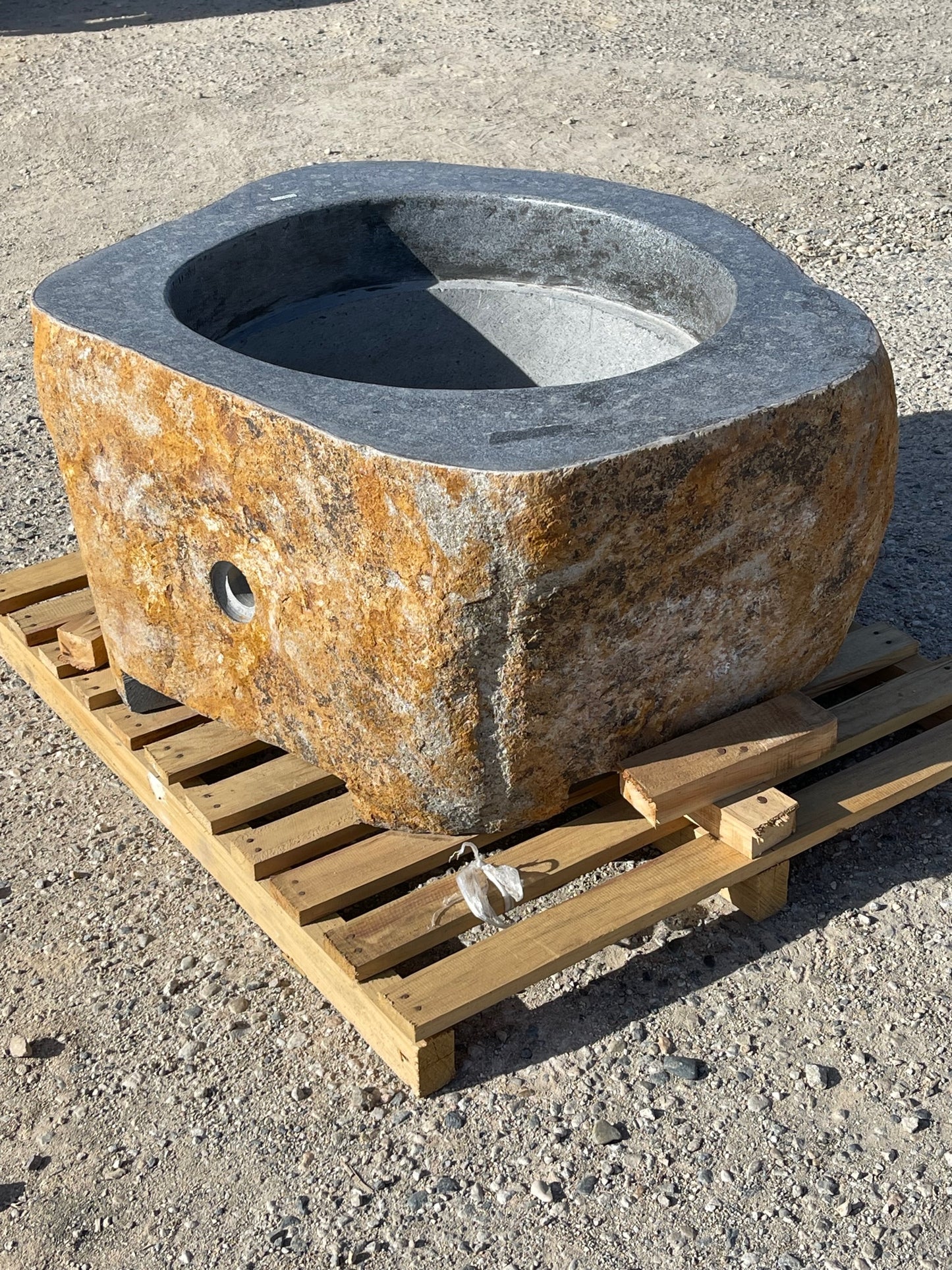 Real rock boulder or stone propane or natural gas burning fire pits from Impact Imports