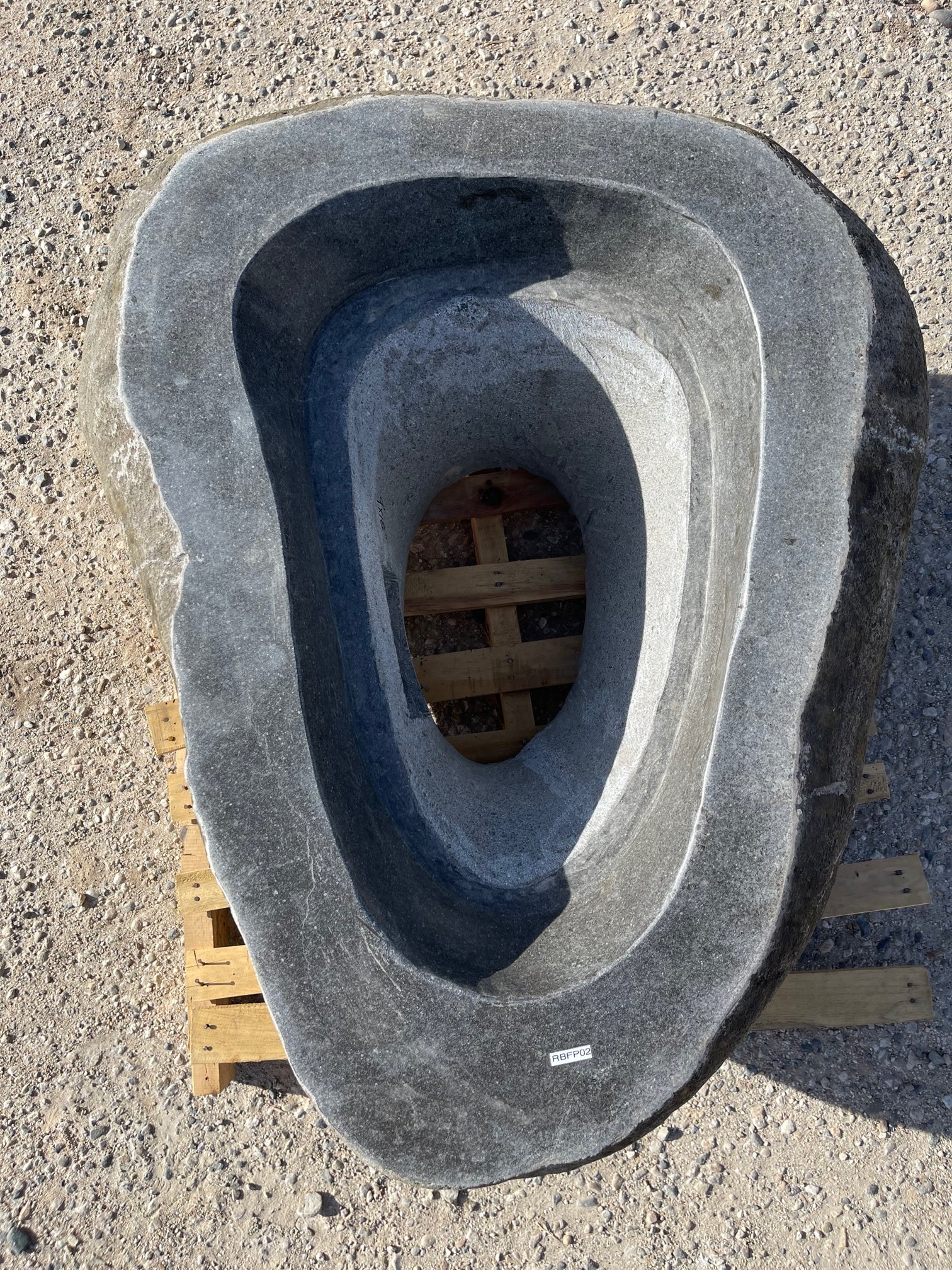 Top view of a Large Real rock boulder or stone propane or natural gas burning fire pits from Impact Imports