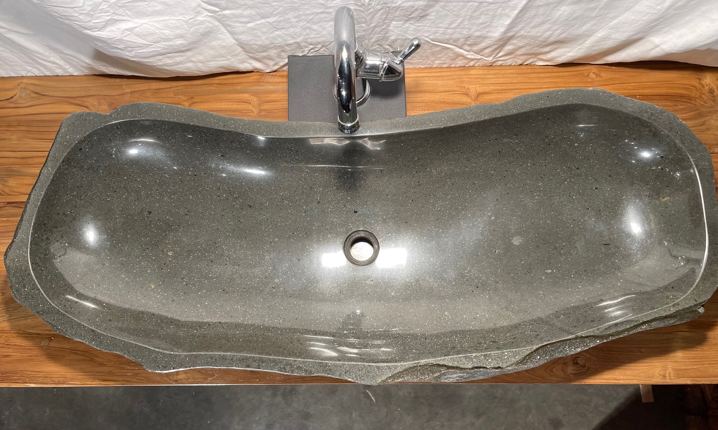 Extra large long Natural Stone or River Rock or River Boulder bathroom vessel sink at Impact Imports in Boise, Idaho