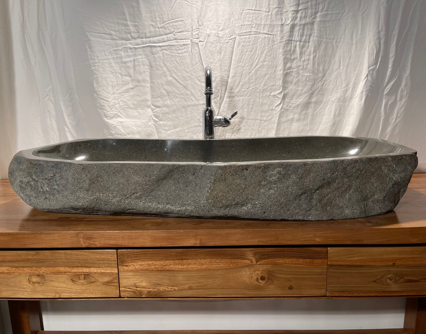 Extra large long Natural Stone or River Rock or River Boulder bathroom vessel sink at Impact Imports in Boise, Idaho