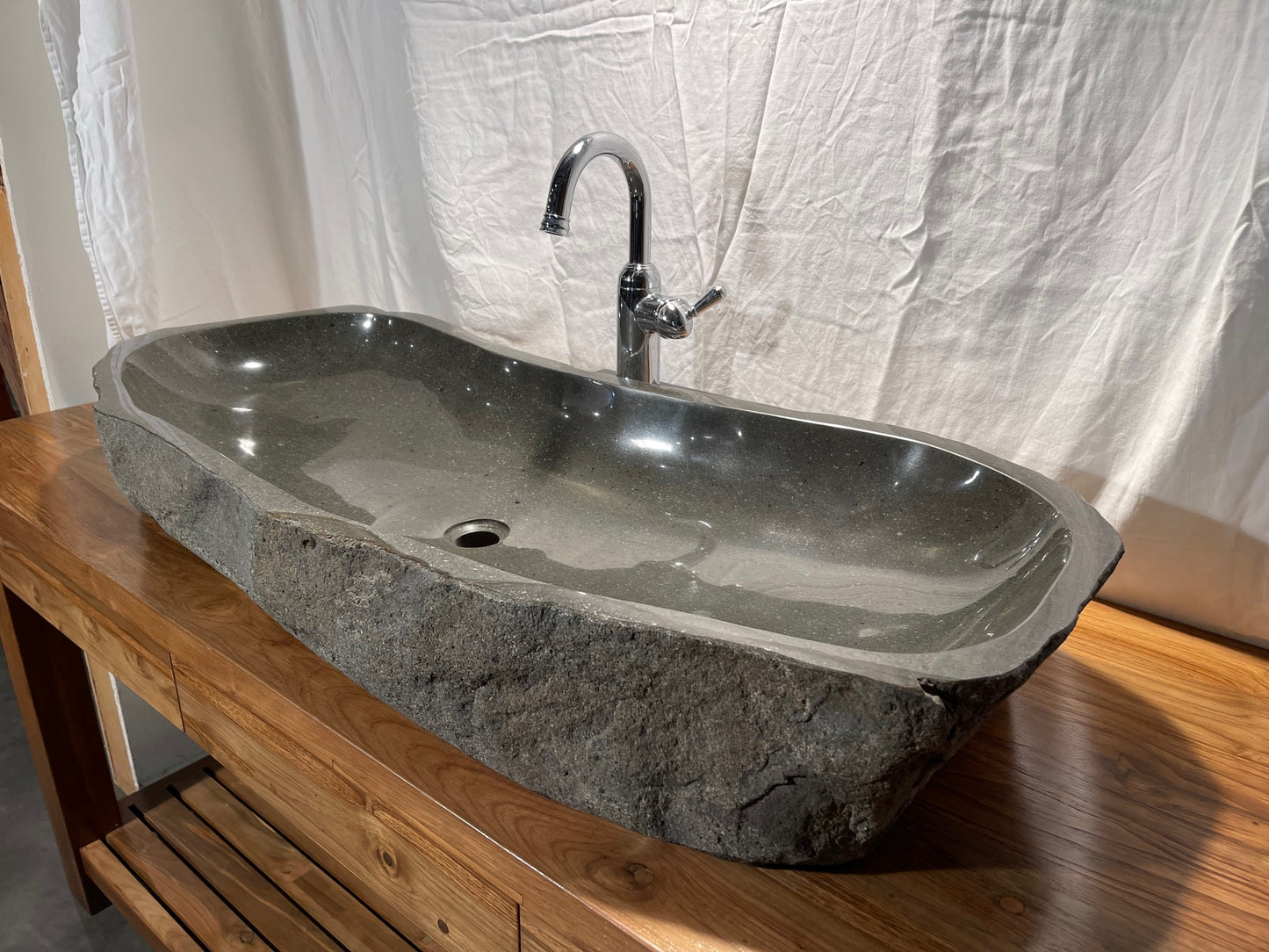 Extra large long Natural Stone or River Rock or River Boulder bathroom vessel sink at Impact Imports in Boise, Idaho