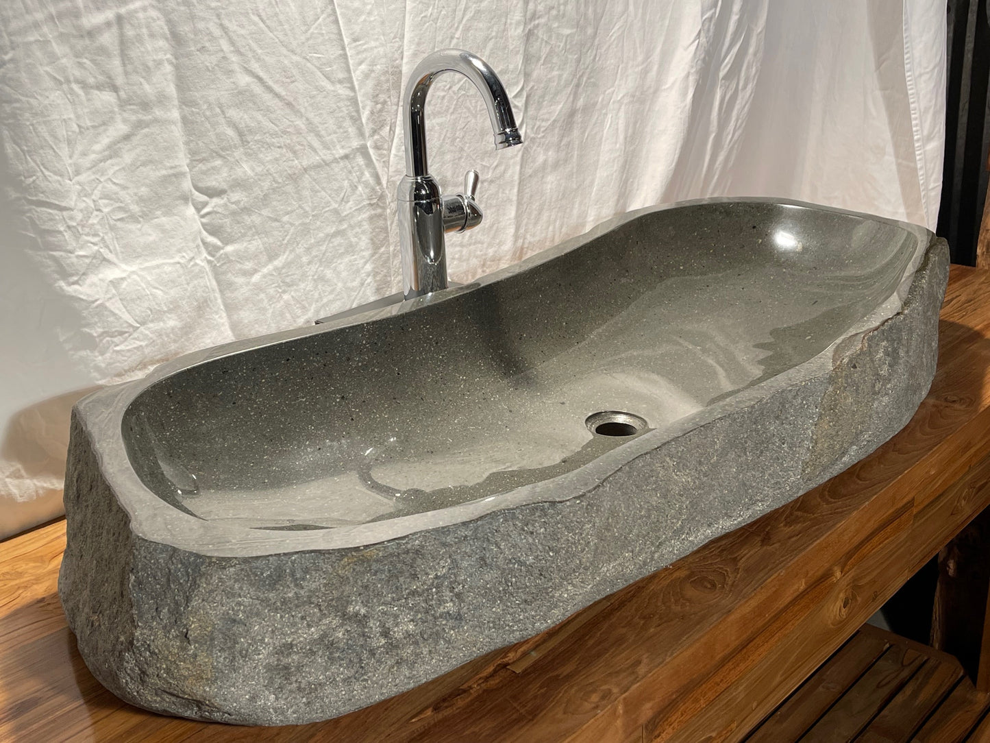 Extra large long Natural Stone or River Rock or River Boulder bathroom vessel sink at Impact Imports in Boise, Idaho