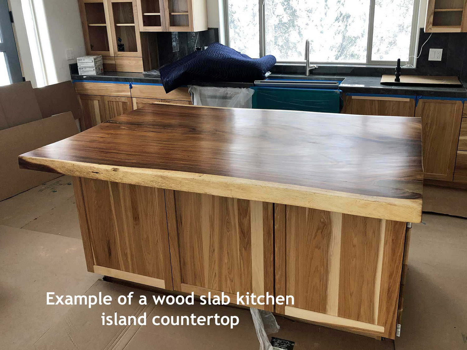 Natural Live Edge wood Slab kitchen island countertop installed in Donnelly Idaho  from Impact Imports in Boise Idaho