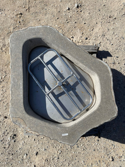 Top view of a real stone propane or natural gas burning fire pit from Impact imports in Boise, Idaho