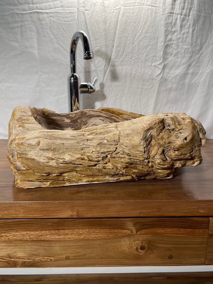 Brown color petrified wood stone vessel sink with log-like appearance at impact imports in boise idaho