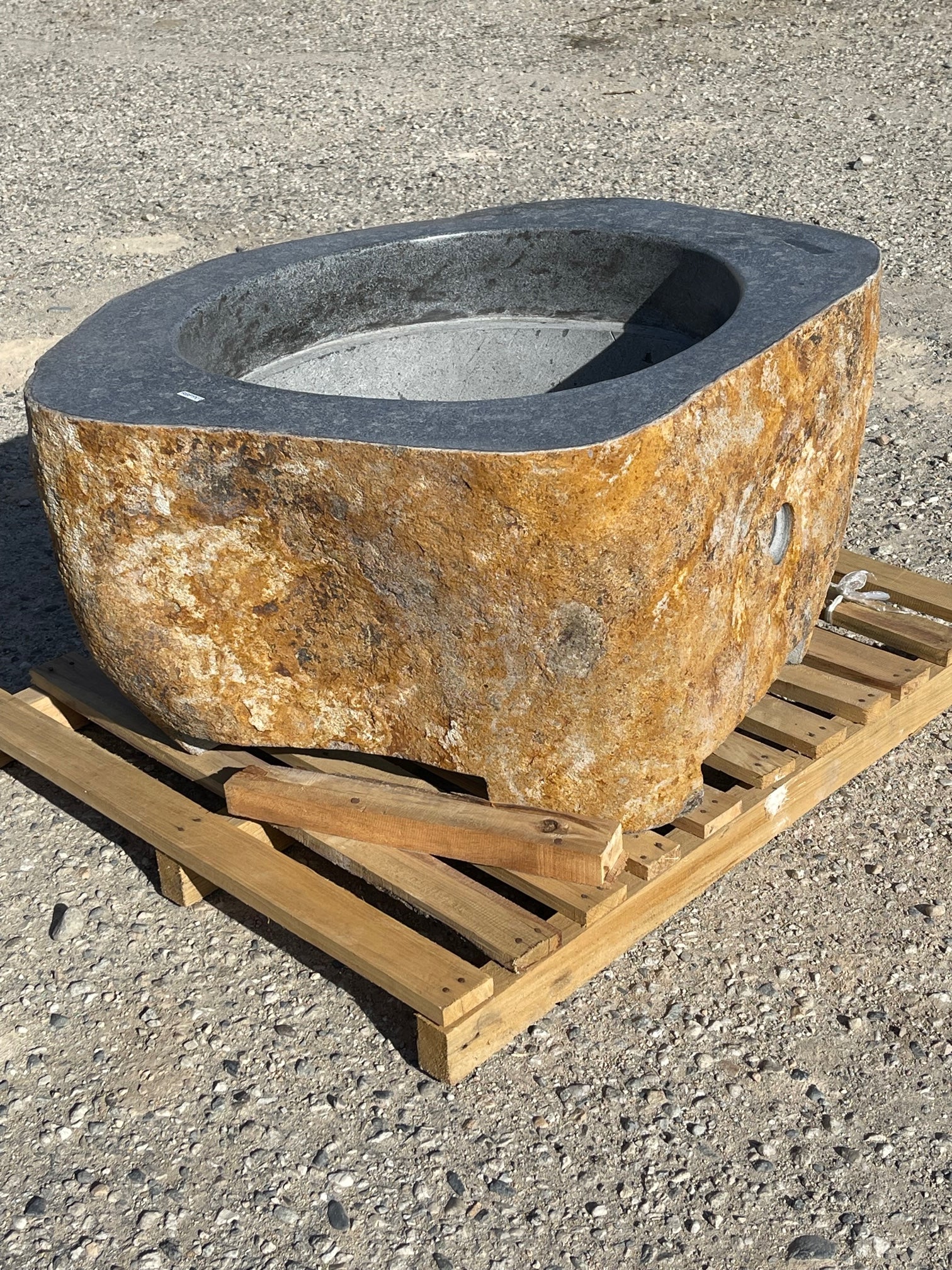 Real rock boulder or stone propane or natural gas burning fire pits from Impact Imports