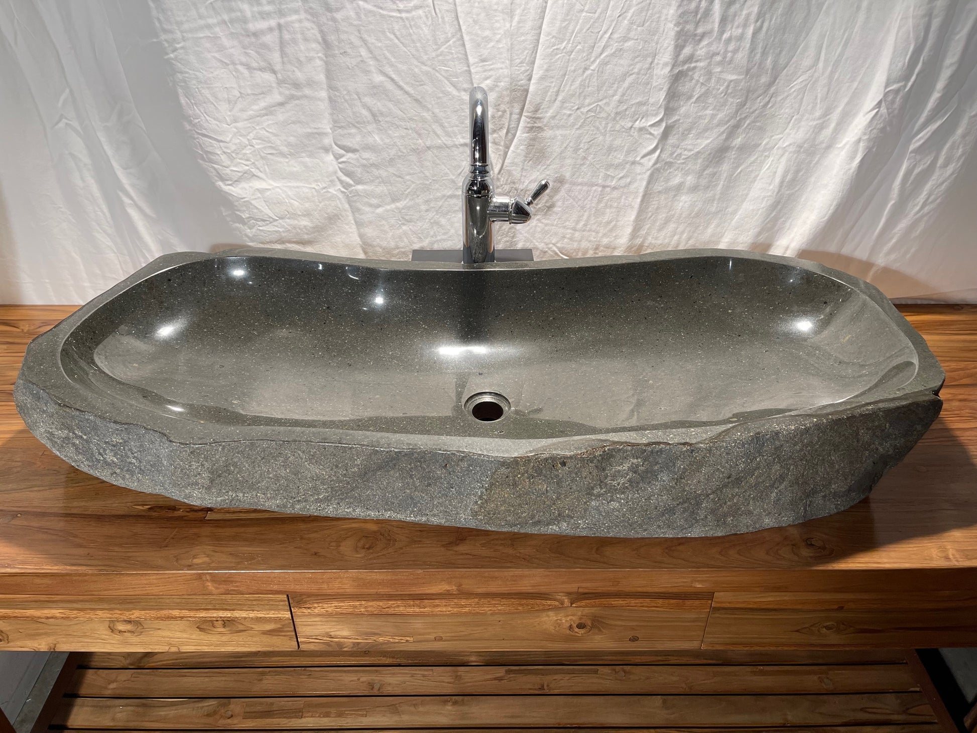 Extra large long Natural Stone or River Rock or River Boulder bathroom vessel sink at Impact Imports in Boise, Idaho