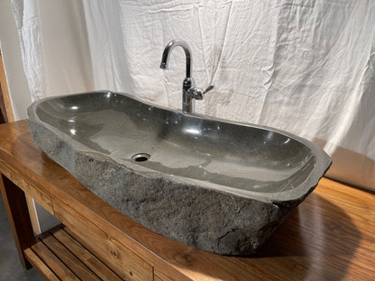 Extra large long Natural Stone or River Rock or River Boulder bathroom vessel sink at Impact Imports in Boise, Idaho