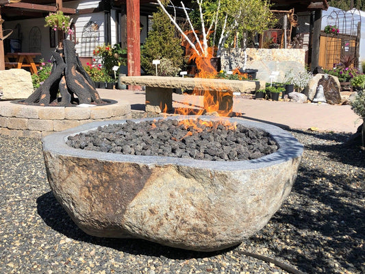 Real rock boulder or stone propane or natural gas burning fire pits from Impact Imports