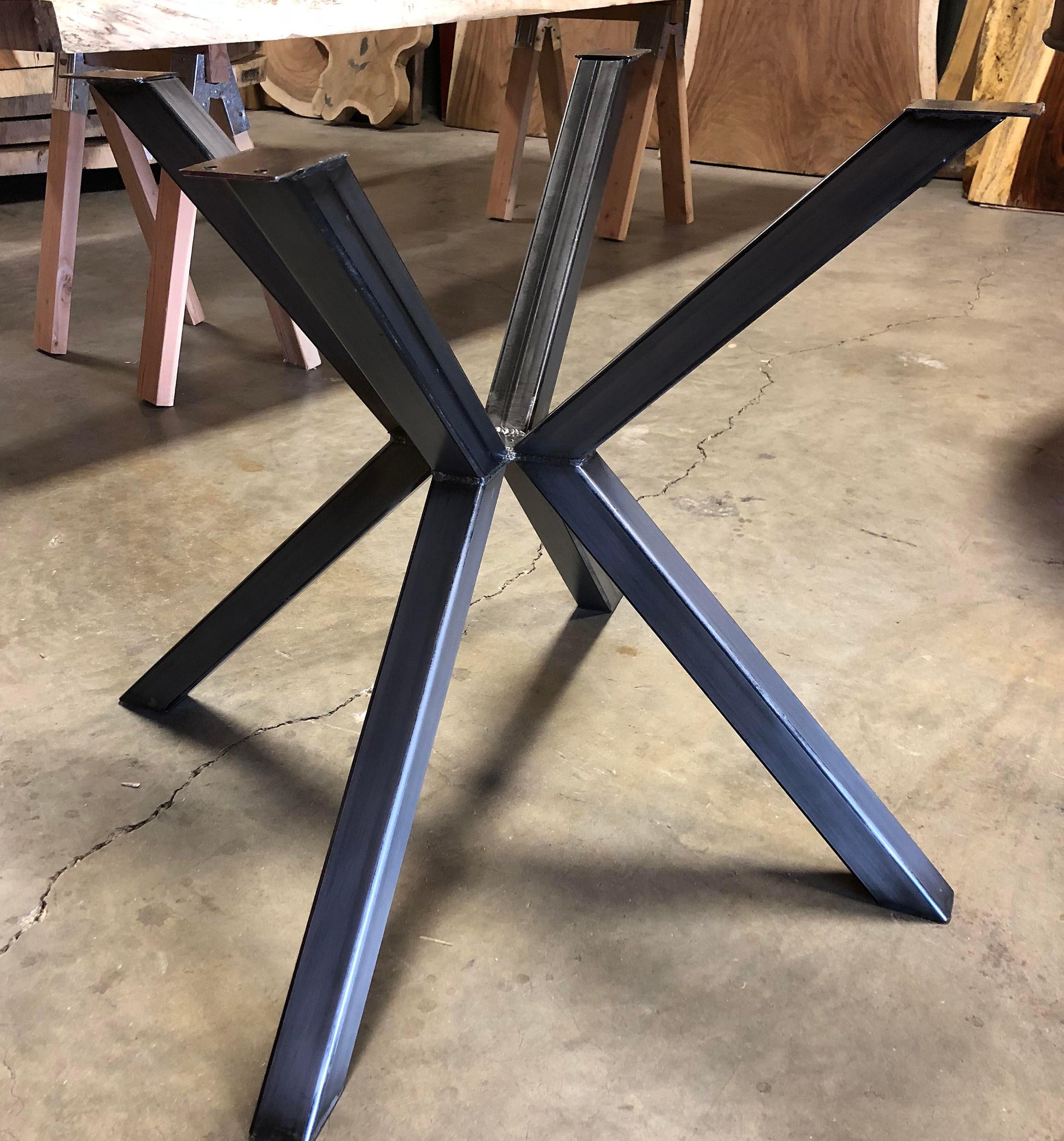 steel pedestal dining table base.